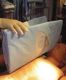 It is recommended that the person applying the drape have also adhered to hand hygiene and full