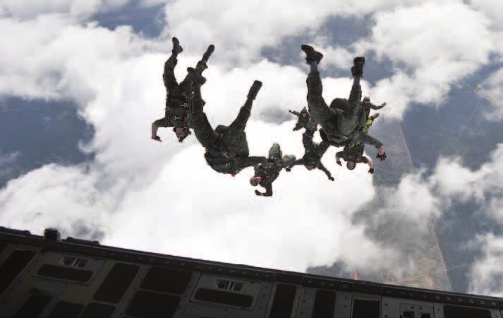 BELOW: CSOR members conduct a freefall jump out of a U.S. Air Force C-17 Globemaster III.