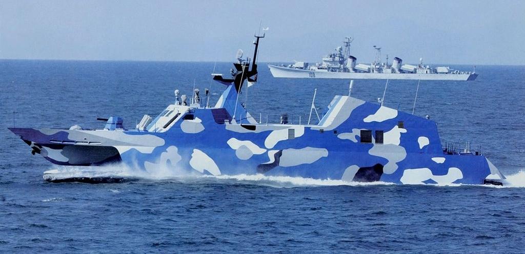 Figure 8. Houbei (Type 022) Class Fast Attack Craft With an older Luda-class destroyer behind Source: Photograph provided to CRS by Navy Office of Legislative Affairs, December 2010.