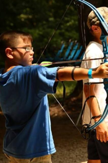 The camp offered the youth a variety of unique experiences such as zip-lining, archery, shooting sports,