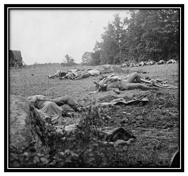 CW3.4.8 Civil War Battle Stations Gettysburg (July 3, 1863) Gettysburg, Pa. Confederate dead gathered for burial at the edge of the Rose woods, July 5, 1863. Source: Library of Congress: http://www.
