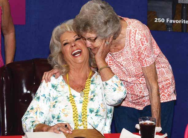 Paula Deen visits Fort Jackson Paula Deen, world renowned chef and author, smiles as he hugs Fort Jackson community member Jeanette Coltrain after signing Deen s new