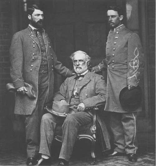 A MATHEW BRADY PHOTOGRAPH OF LEE, HIS SON CUSTIS (LEFT) AND ADJUTANT LIEUTEN- ANT COLONEL WALTER TAYLOR TAKEN SHORTLY AFTER THE SURRENDER.