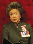 The Right Honourable Adrienne Clarkson, PC, CC, CMM, COM, CD, during the Speech from the Throne, 5 October 2004 The Right Honourable Michaëlle Jean, CC, CMM, COM, CD, taking the salute during the