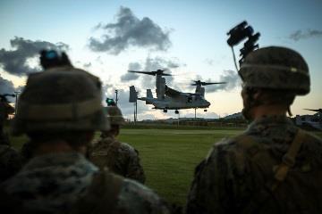 The Lava Dogs hunkered down for two typhoons and then conducted a night-time raid, using helicopters to take us to the fight. The company attacked an exercise force consisting of roughly 30 Marines.