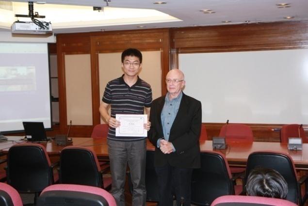 the Best Paper and Best Presentation Awards to Mr. Shang Xia at the Postgraduate Research Symposium.