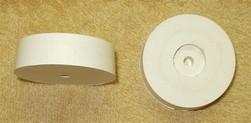 Item: 4530 White rubber cylindrical plug with central hole fitted