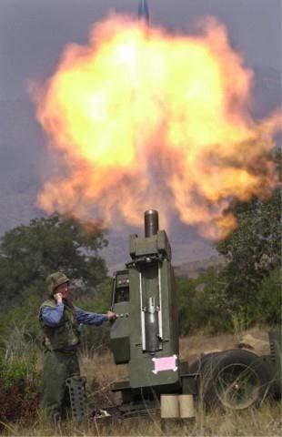 MCWL Experiments Developed Dragon Fire using parts from a French Army rifled 120mm mortar Integrated communications, fire control,