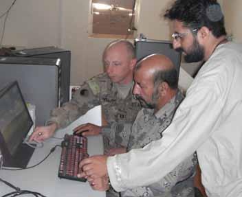 A member of the Commercial Imagery team, in support of Operation Iraqi Freedom, shares imagery with coalition forces.