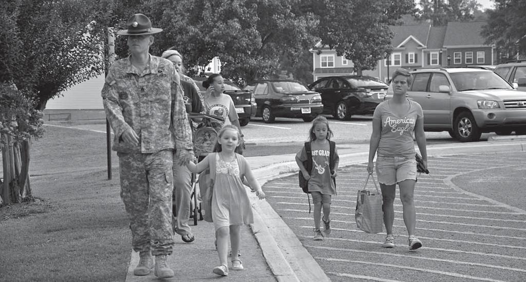 NEWS Leader file photo Parents take children to Pierce Terrace Elementary at the start of school in 2014.