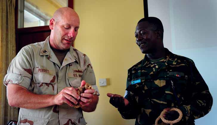 Forum Building Partner Capacity in Africa Navy member of Combined Joint Task Force Horn of Africa demonstrates knots to Tanzanian sailor U.S.