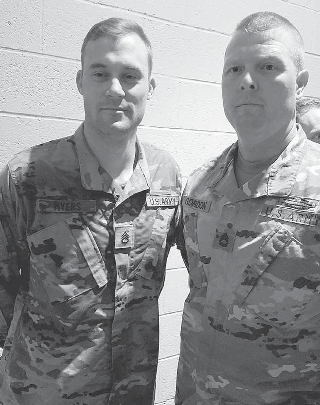 ) Caleb Wright Army Reserve Staff Sgt. Clint Myers, left, a Kingsport, Tenn.,native, stands with Sgt.