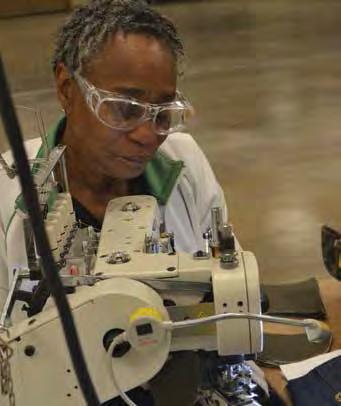 Joyce Ladd works at a sewing station on the new textile production line at Pine Bluff Arsenal. (U.S.