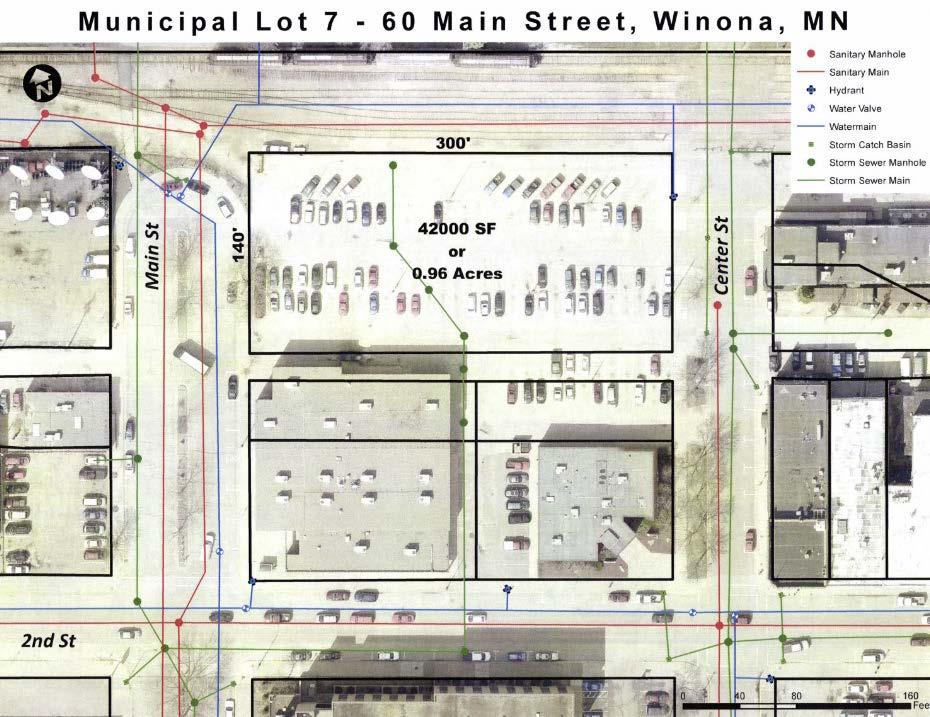 Existing Property Description The 60 Main Street site currently consists of a surface-level parking lot overlooking the Mississippi River. The lot is approximately 300 x 140 and 42,000 square feet or.
