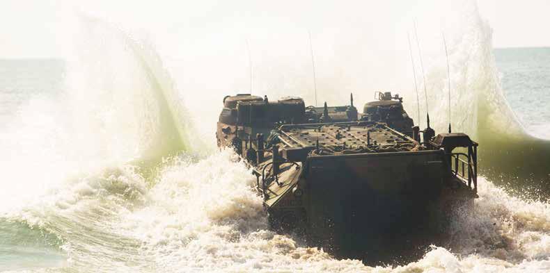 An Amphibious Assault Vehicle launches into the water to perform amphibious breaching operations. (U.S. Marine Corps photo by Cpl.
