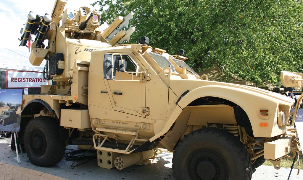 AIR DEFENSE (Photo courtesy of The Boeing Company) A Boeing multimission Avenger turret mounted on a mine-resistant, ambush-protected, all-terrain vehicle stands on display at a defense symposium 28