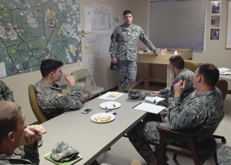 A 1st Infantry SFAAT debriefs a mission at Fort Polk, La. The eight-day Security Force Assistance Advisor Course was held in November 2012.
