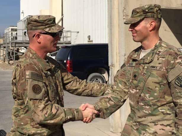 agement Task Force and senior Army leaders to enable better strategic TM. Col. Stephen Bousquet, commander of the 369th Sustainment Brigade, congratulates Lt. Col. Joel Buffardi following his promotion ceremony in Iraq on Nov.