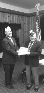 Farmington Post 28 Vice Commander Ray Edgar, left, receives the 100% membership award along with an Americanism Award from Area 2 Commander Kirk Thurston.