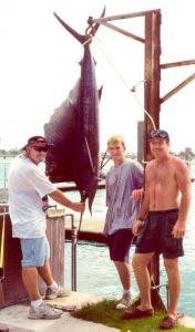 Big catch (Photo courtesy of Lana Gideon) Flynn Gideon, Jeremy Gideon and Guy Baker caught this seven-foot, 100-pound sailfish near the shark pit recently. Junior Boys Basketball Saturday 5:30 p.m. B&S Hoopsters/Coast Guard I 6:30 p.