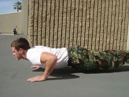 Page 28 of 35 Figure 2: The Down position of the push-up notice the arms form right angles and the back, buttocks, and