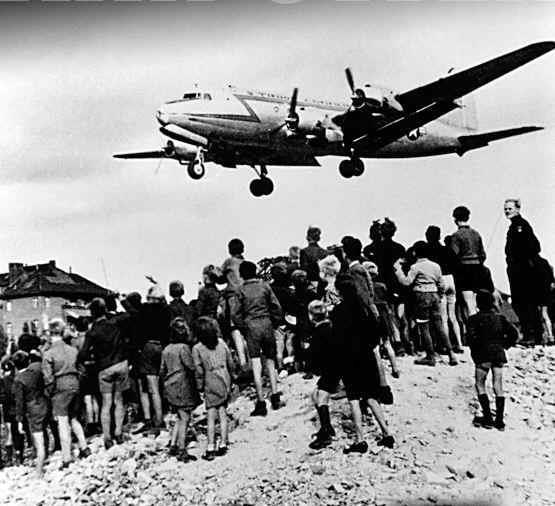 The Berlin Airlift (1947) In 1947, the USSR puts a blockade around west Berlin, giving Truman