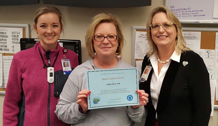 Recent Great Catch Award Recipient Cindy Davis, LPN in the General Pediatric Clinic with her Director,