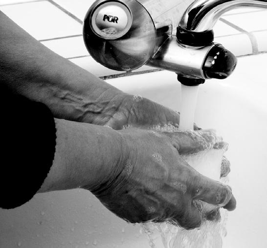 Turn on the faucet and adjust the water to a lukewarm temperature. Leave the water running. 2. Wet your hands and wrists under the running water and apply soap. 3.