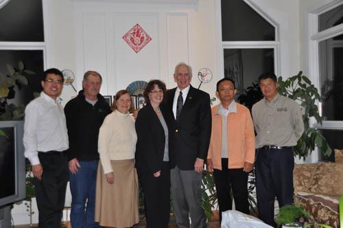 Jingong Yin, MD, PhD, (2nd from right), Vice President of the Fourth Military Medical University (FMMU) in Xi'an, is welcomed at a reception hosted by Dr. Jun Ren (far right).