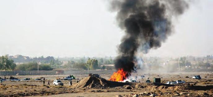 COUNTERNARCOTICS The Afghan National Police set fire to approximately three tons of confiscated drugs during a controlled drug burn at Bost Airfield, Afghanistan, Nov. 2, 2017.