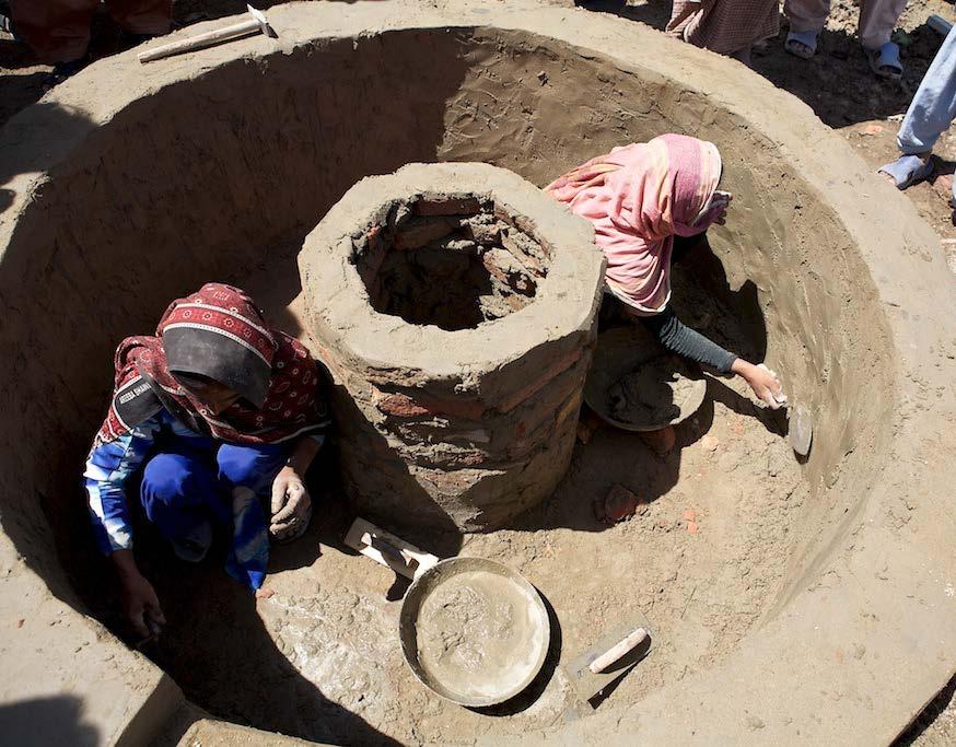 Breaking traditional gender barriers, after the 2010 Pakistan floods, the women of Sindh learned masonry through UNDP's Cash-for- Work project--part of the wider Livelihoods & Economic Recovery