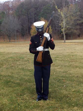 MARINE CORPS DRILL AND CEREMONIES MANUAL e. Count Four. f. Count Five. Figure A-9.--Inspection Arms from Order Arms--Continued.