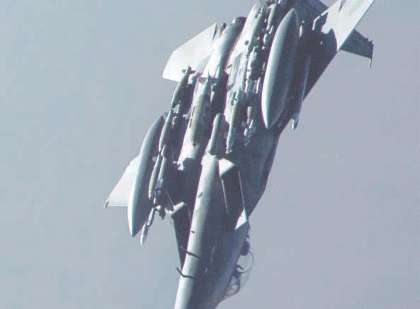 They responded quickly when an F-15E like this one descending after refueling caught fire on the flight line. spot at that point, the major explained in an Air Force news release.