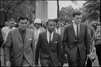 Edwin Walker provoke a riot over the admittance of James Meredith at Ole Miss.