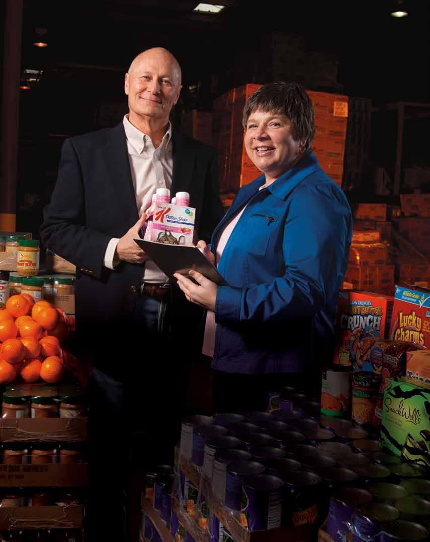 Community Development Works Jayne Wright-Velez, executive director of the Food Bank of Central Louisiana, with past board chairman Brian Couvillon nonprofit Works Jane Wright-Velez Executive Director