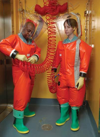 Scientists preparing to enter a BSL-4 laboratory.