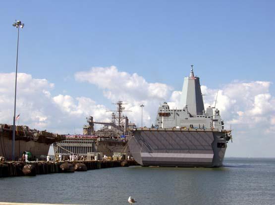 For the past 41 years AUSTIN has been referred to as the flagship of the Texas Navy. (Left to Right) USS AUSTIN (LPD-4) has been replaced by USS SAN ANTO- NIO (LPD-17).