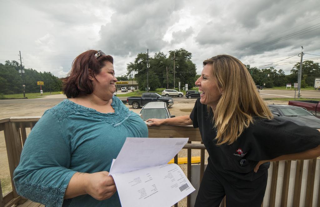 After rains flooded Ponchatoula, Louisiana, twice in one year, local residents including Dawn suffered financially and emotionally.