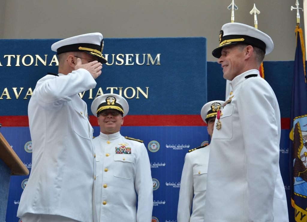 NMETC NEWS 12 CAPT Paul Kane, left, relieves CAPT James P. Norton of his duties as NMOTC commanding officer during a ceremony at the National Naval Aviation Museum at Naval Air Station Pensacola Aug.