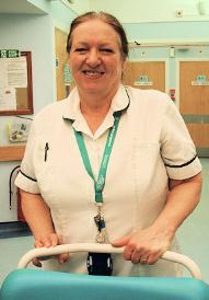Occupational Therapists wear a white top with