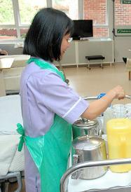 Assistant Housekeepers wear a lilac tunic or dress
