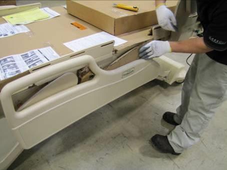 Pull out all packaging tucked in between the rail arms, panel, and