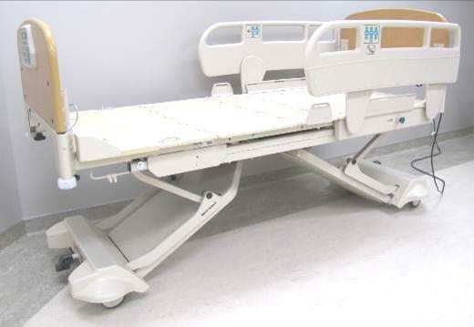 6 Optional Electronic Foot Siderail Release Plastic Long High Head Siderails (optional wood head and footboards with beige inlays shown) To accommodate the needs of some patients to have a greater
