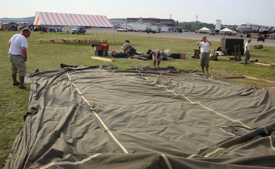 Sunday evening breakdown took us more than a few hours. Here we take the main tent down and disassemble all the displays.