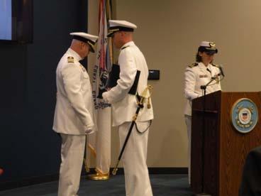 COC continued Captain McLellan receiving a ribbon from Captain Richard Timme, Commander Sector Ohio Valley, LCDR Heather Stratton at the podium The Ship s Log: Third Watch relieved.