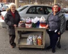 In December 2017, members of VFW Auxiliary 9127 in Beaverdale, along with the Des Moines campus Auxiliary Department Hospital Representative, Carol Holmes, helped hand out Christmas gifts (shirts)