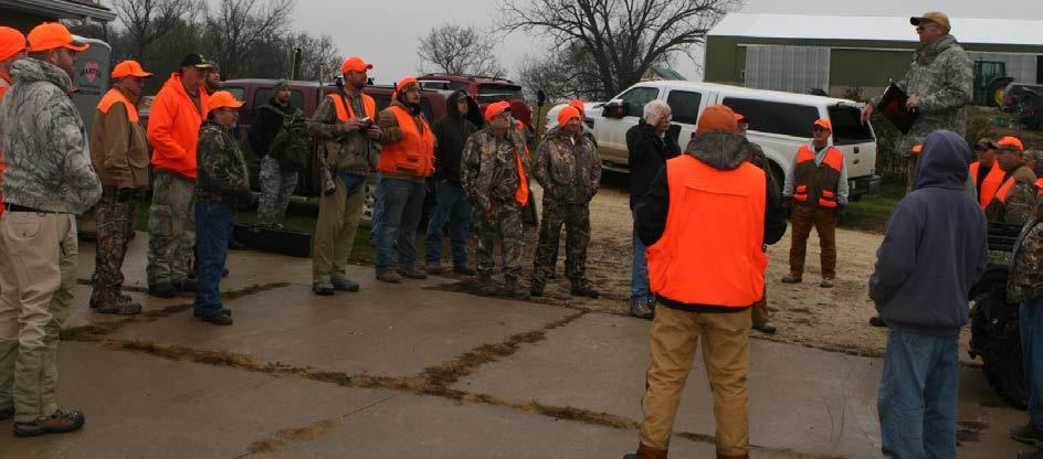 Post Chaplain Carl Moyer. Post 9663 1st vice commander and main event coordinator Tim Fiedler gives safety instructions to the first of three group hunts.