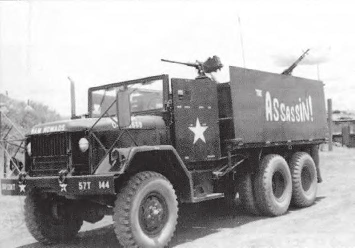 systems on gun trucks. A sandbagged dog house was mounted on the back of some trucks to house a squad automatic weapon gunner.
