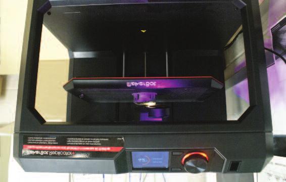 Using the MakerBot 3-D printer donated by the