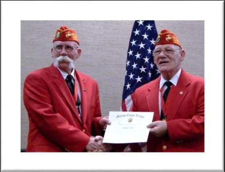Awards Page 6 Senior Vice Commandant Steve Tracy (L) awarded Swansboro Marine Corps League #1407 Marine